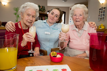 Mary Evans Care assistant Nancy Broad and Enid Becker celebrate the win by Briarfields.